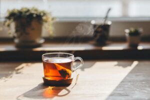 Cozy cottagecore morning with tea and sunlight